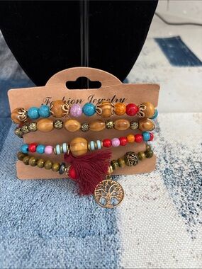 Fashion Jewelry Multicolor Beaded Bracelet Stack with Red Tassel and Tree Charm